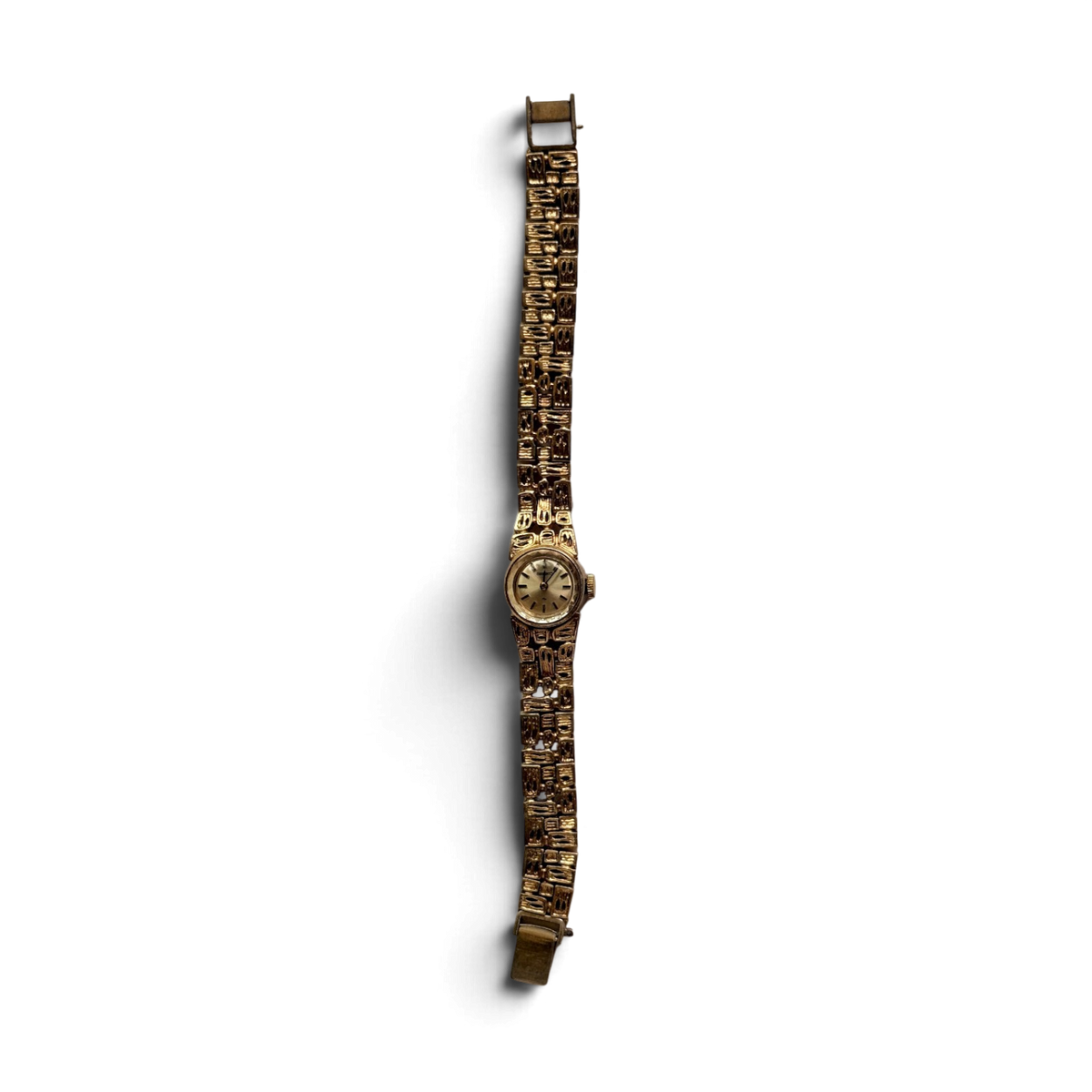 Vintage Seiko 11-0549 ladies' manual wind watch, full view on its sculptural gold-tone bracelet