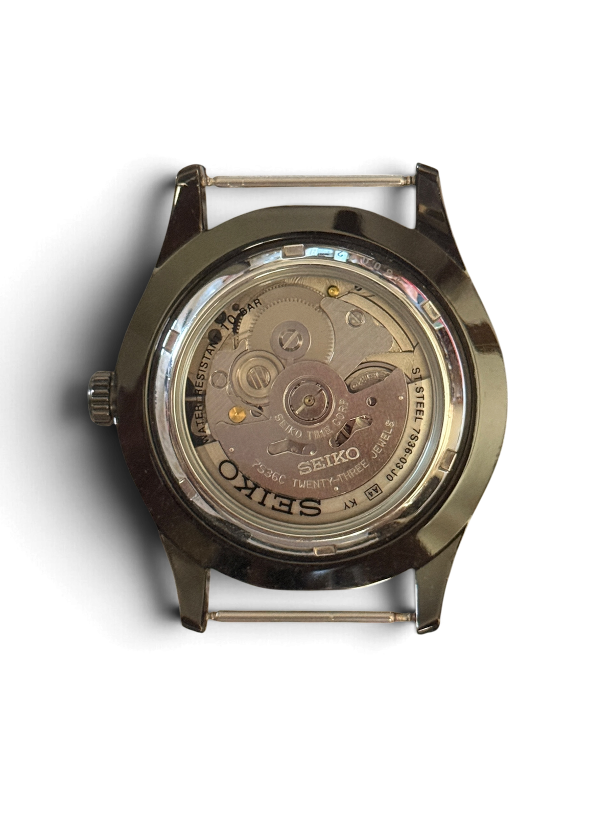 Display caseback of the Seiko 5 Sports SNZG17 marked 7S36-03J0, showing the 7S36 movement