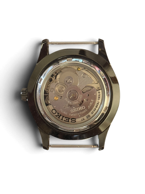 Display caseback of the Seiko 5 Sports SNZG17 marked 7S36-03J0, showing the 7S36 movement