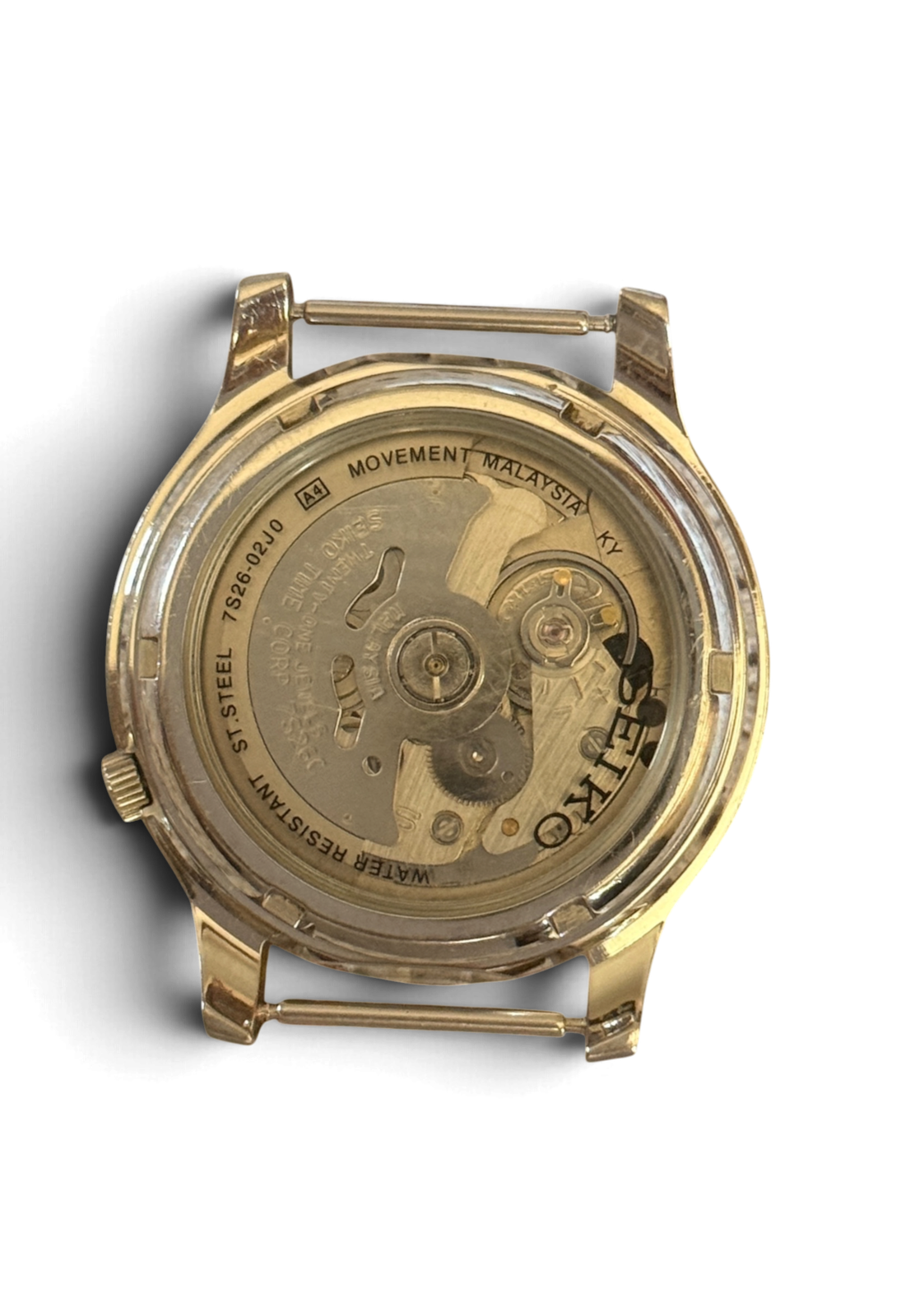 Display caseback of the Seiko 5 SNK809 marked 7S26-02J0 and Movement Malaysia, spring bars installed