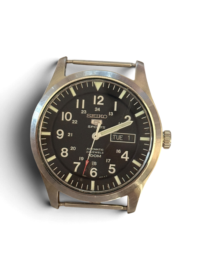 Seiko 5 Sports SNZG15 watch head with steel case and black military dial