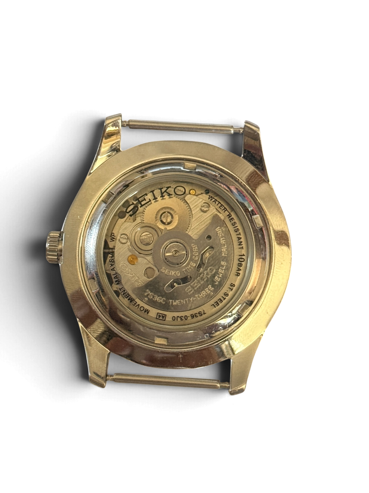 Display caseback of the Seiko 5 Sports SNZG15 marked 7S36-03J0 and Movement Malaysia